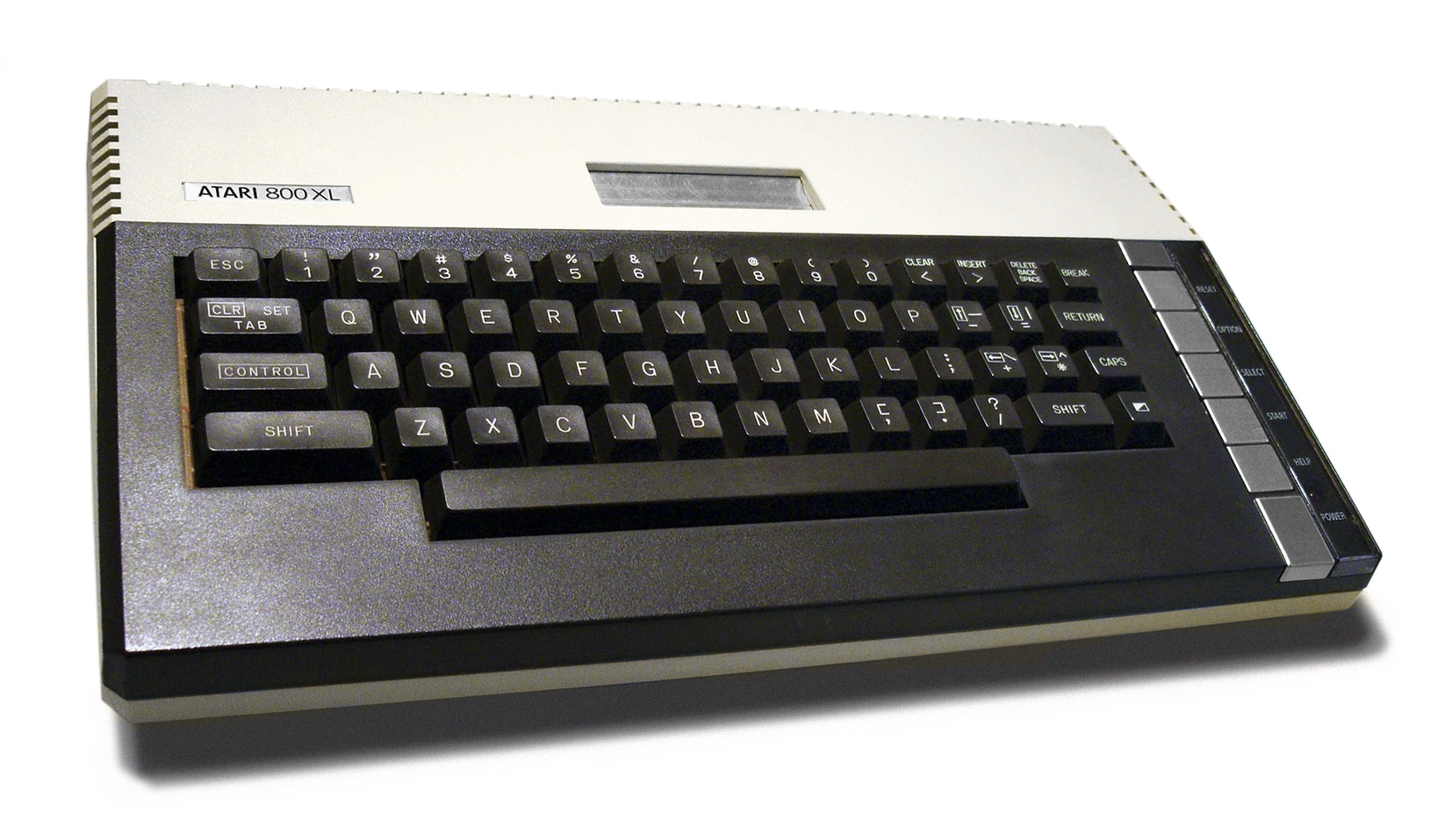 Atari 800XL: beżowa obudowa, ciemna klawiatura i pięć srebrnych przycisków funkcyjnych